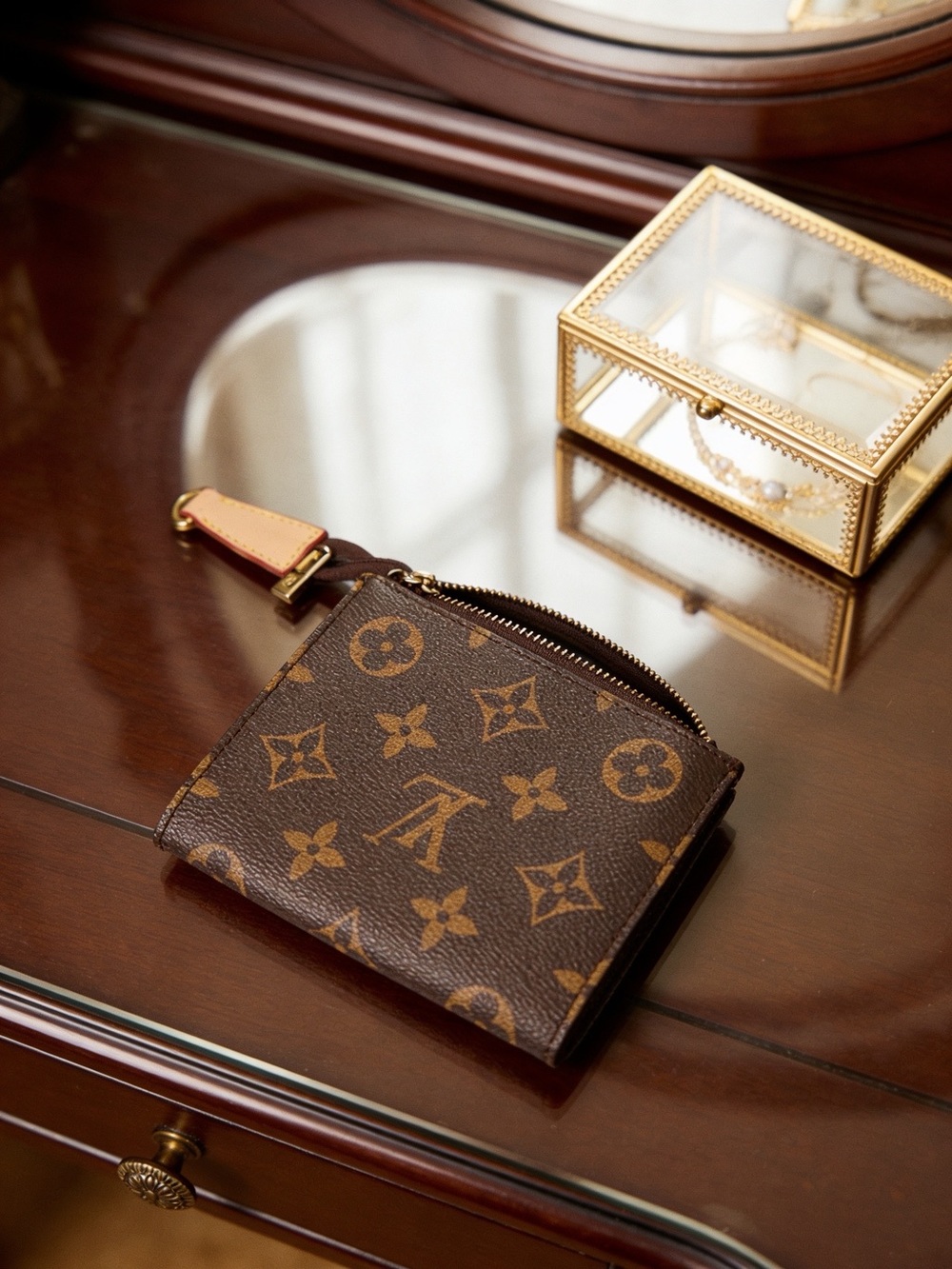 Louis Vuitton Lisa Wallet in classic Monogram canvas.